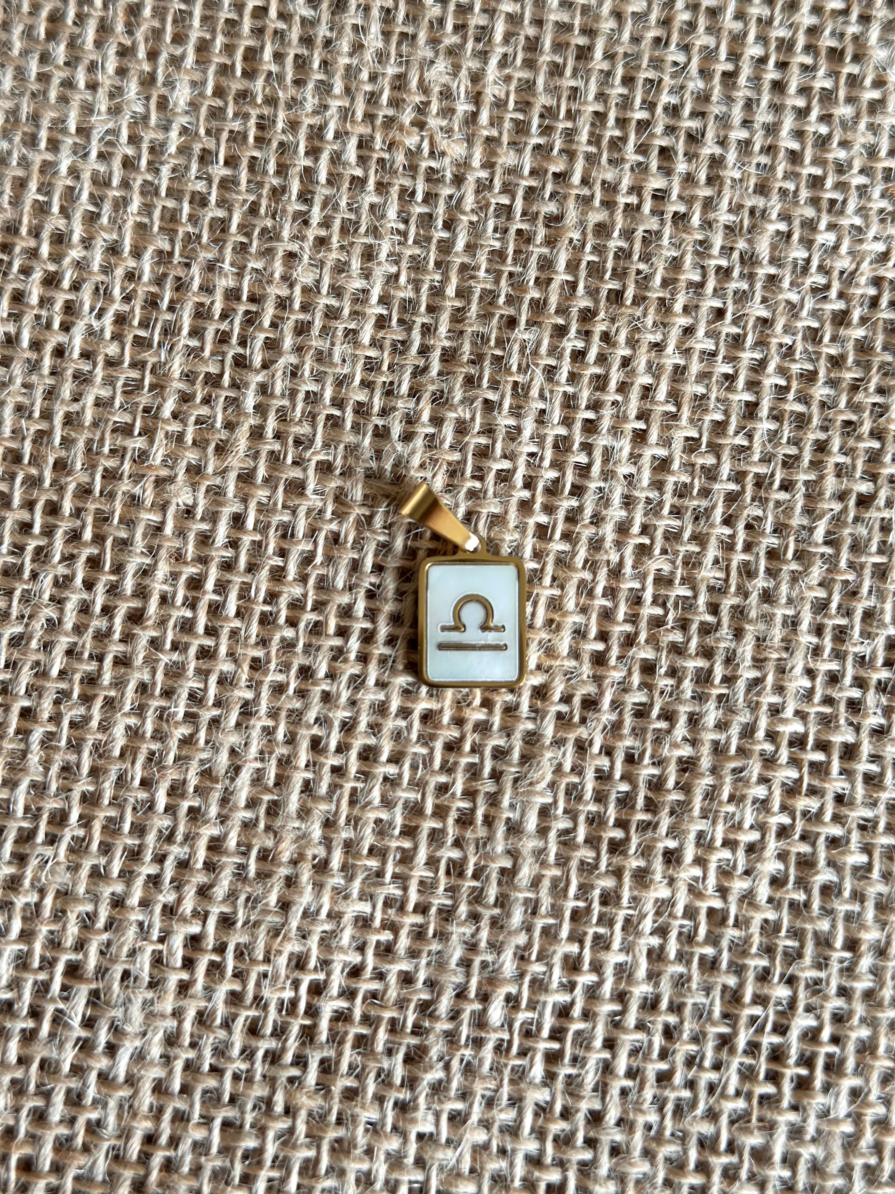 Charm astro "Balance" doré